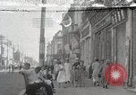 Standbild chinesischen Eastern Railway Fahne über dem Bahnhof Harbin Manchukuo, 1932, aus Sekunde 27 historischem Filmmaterial Videoclip 65675025073