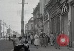 Standbild chinesischen Eastern Railway Fahne über dem Bahnhof Harbin Manchukuo, 1932, aus Sekunde 28 historischem Filmmaterial Videoclip 65675025073