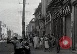 Standbild chinesischen Eastern Railway Fahne über dem Bahnhof Harbin Manchukuo, 1932, aus Sekunde 29 historischem Filmmaterial Videoclip 65675025073