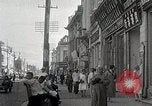 Standbild chinesischen Eastern Railway Fahne über dem Bahnhof Harbin Manchukuo, 1932, aus Sekunde 32 historischem Filmmaterial Videoclip 65675025073