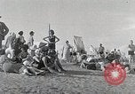 Standbild chinesischen Eastern Railway Fahne über dem Bahnhof Harbin Manchukuo, 1932, aus Sekunde 46 historischem Filmmaterial Videoclip 65675025073