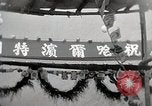 Standbild feiern Schaffung von Manchukuo Harbin Manchukuo, 1932, aus Sekunde 13 historischem Filmmaterial Videoclip 65675025074