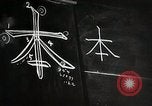 Image of Learning Japanese characters Japan, 1945, second 15 stock footage video 65675025077