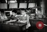 Image of Students doing assembly work Japan, 1945, second 51 stock footage video 65675025079