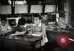 Image of Students doing assembly work Japan, 1945, second 52 stock footage video 65675025079