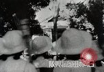 Image of Japanese citizen volunteers in war effort Japan, 1945, second 3 stock footage video 65675025091