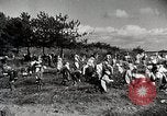 Image of Japanese citizen volunteers in war effort Japan, 1945, second 40 stock footage video 65675025091