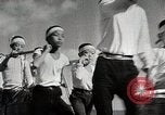 Image of Japanese citizen volunteers in war effort Japan, 1945, second 60 stock footage video 65675025091