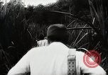 Standbild Kampf für Palembang Ölraffinerien Palembang Indonesien, 1942, aus Sekunde 37 historischem Filmmaterial Videoclip 65675025093