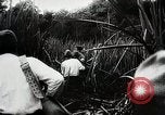 Standbild Kampf für Palembang Ölraffinerien Palembang Indonesien, 1942, aus Sekunde 39 historischem Filmmaterial Videoclip 65675025093