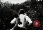 Standbild Kampf für Palembang Ölraffinerien Palembang Indonesien, 1942, aus Sekunde 41 historischem Filmmaterial Videoclip 65675025093