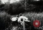 Standbild Kampf für Palembang Ölraffinerien Palembang Indonesien, 1942, aus Sekunde 43 historischem Filmmaterial Videoclip 65675025093