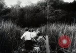 Standbild Kampf für Palembang Ölraffinerien Palembang Indonesien, 1942, aus Sekunde 48 historischem Filmmaterial Videoclip 65675025093
