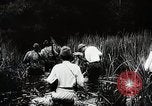 Standbild Kampf für Palembang Ölraffinerien Palembang Indonesien, 1942, aus Sekunde 57 historischem Filmmaterial Videoclip 65675025093