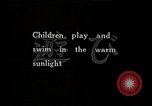 Image of Children Play and Adults Work in rice Fields During Spring Time Japan, 1934, second 3 stock footage video 65675025118