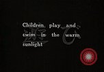 Image of Children Play and Adults Work in rice Fields During Spring Time Japan, 1934, second 5 stock footage video 65675025118