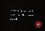 Image of Children Play and Adults Work in rice Fields During Spring Time Japan, 1934, second 7 stock footage video 65675025118