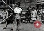 Image of Children Play and Adults Work in rice Fields During Spring Time Japan, 1934, second 19 stock footage video 65675025118