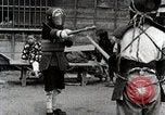 Image of Children Play and Adults Work in rice Fields During Spring Time Japan, 1934, second 21 stock footage video 65675025118