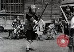 Image of Children Play and Adults Work in rice Fields During Spring Time Japan, 1934, second 24 stock footage video 65675025118