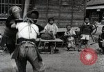 Image of Children Play and Adults Work in rice Fields During Spring Time Japan, 1934, second 28 stock footage video 65675025118