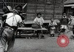 Image of Children Play and Adults Work in rice Fields During Spring Time Japan, 1934, second 29 stock footage video 65675025118