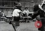 Image of Children Play and Adults Work in rice Fields During Spring Time Japan, 1934, second 31 stock footage video 65675025118