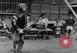 Image of Children Play and Adults Work in rice Fields During Spring Time Japan, 1934, second 32 stock footage video 65675025118