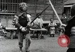 Image of Children Play and Adults Work in rice Fields During Spring Time Japan, 1934, second 33 stock footage video 65675025118