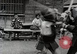 Image of Children Play and Adults Work in rice Fields During Spring Time Japan, 1934, second 34 stock footage video 65675025118