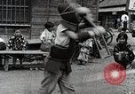 Image of Children Play and Adults Work in rice Fields During Spring Time Japan, 1934, second 37 stock footage video 65675025118