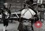 Image of Children Play and Adults Work in rice Fields During Spring Time Japan, 1934, second 41 stock footage video 65675025118
