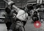 Image of Children Play and Adults Work in rice Fields During Spring Time Japan, 1934, second 43 stock footage video 65675025118