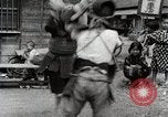 Image of Children Play and Adults Work in rice Fields During Spring Time Japan, 1934, second 44 stock footage video 65675025118