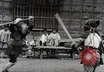 Image of Children Play and Adults Work in rice Fields During Spring Time Japan, 1934, second 45 stock footage video 65675025118
