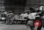 Image of Children Play and Adults Work in rice Fields During Spring Time Japan, 1934, second 47 stock footage video 65675025118