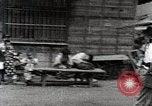 Image of Children Play and Adults Work in rice Fields During Spring Time Japan, 1934, second 49 stock footage video 65675025118