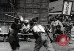 Image of Children Play and Adults Work in rice Fields During Spring Time Japan, 1934, second 52 stock footage video 65675025118