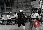 Image of Children Play and Adults Work in rice Fields During Spring Time Japan, 1934, second 55 stock footage video 65675025118