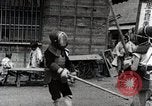 Image of Children Play and Adults Work in rice Fields During Spring Time Japan, 1934, second 57 stock footage video 65675025118