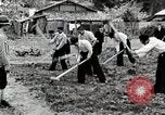 Image of Students Cleaning Ground Honshu Japan, 1935, second 22 stock footage video 65675025145