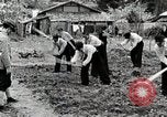 Image of Students Cleaning Ground Honshu Japan, 1935, second 23 stock footage video 65675025145