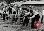 Image of Students Cleaning Ground Honshu Japan, 1935, second 43 stock footage video 65675025145