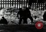 Image of People Clear Snow Japan, 1935, second 1 stock footage video 65675025153