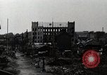 Standbild Japanische Bürger reißen Luftschutzbunker Tokio Japan Shiba Bezirk, 1945, aus Sekunde 11 historischem Filmmaterial Videoclip 65675025162