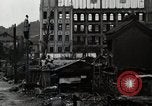Standbild Japanische Bürger reißen Luftschutzbunker Tokio Japan Shiba Bezirk, 1945, aus Sekunde 16 historischem Filmmaterial Videoclip 65675025162