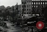 Standbild Japanische Bürger reißen Luftschutzbunker Tokio Japan Shiba Bezirk, 1945, aus Sekunde 25 historischem Filmmaterial Videoclip 65675025162