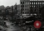 Standbild Japanische Bürger reißen Luftschutzbunker Tokio Japan Shiba Bezirk, 1945, aus Sekunde 26 historischem Filmmaterial Videoclip 65675025162