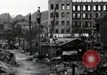 Standbild Japanische Bürger reißen Luftschutzbunker Tokio Japan Shiba Bezirk, 1945, aus Sekunde 27 historischem Filmmaterial Videoclip 65675025162