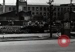 Standbild Japanische Bürger reißen Luftschutzbunker Tokio Japan Shiba Bezirk, 1945, aus Sekunde 39 historischem Filmmaterial Videoclip 65675025162